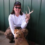 Tracy and dog, Crystal, with antler shed