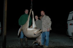 Liam Story with his father, Jared, and his first buck