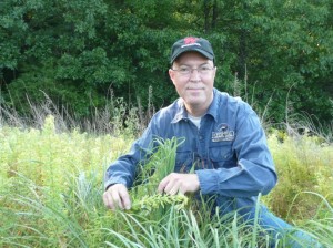 Dr. Grant Woods with sericea lespedeza