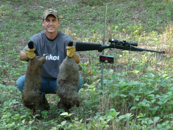 Nathan with two groundhogs