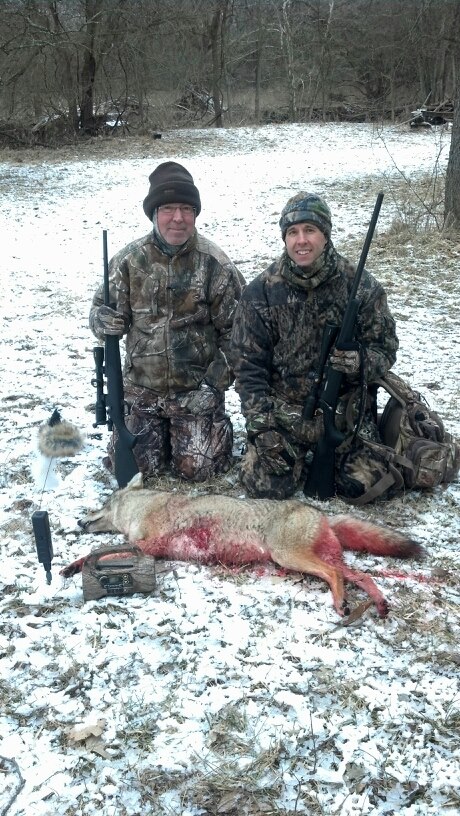 Coyote hunters with coyote they called in  with a fox pro caller and shot with Winchester Varmint X ammo
