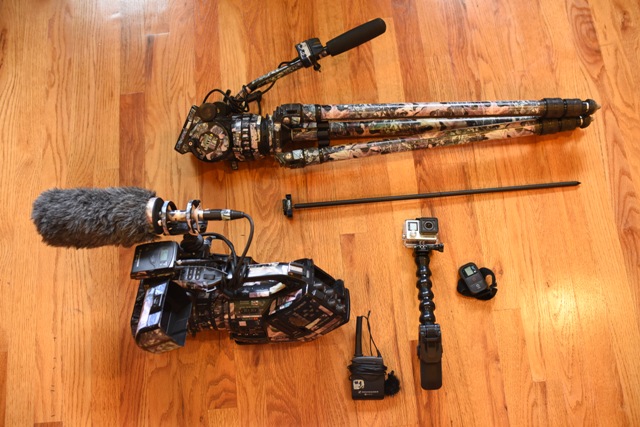 Sony EX3 with lavalier and shotgun mics, tripod, and GoPro with remote and ground stake.