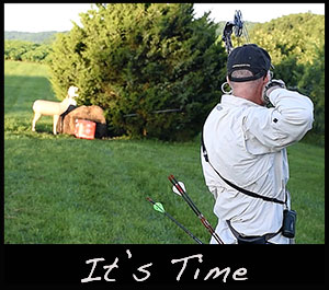 Grant practices with his bow and 3D targets.