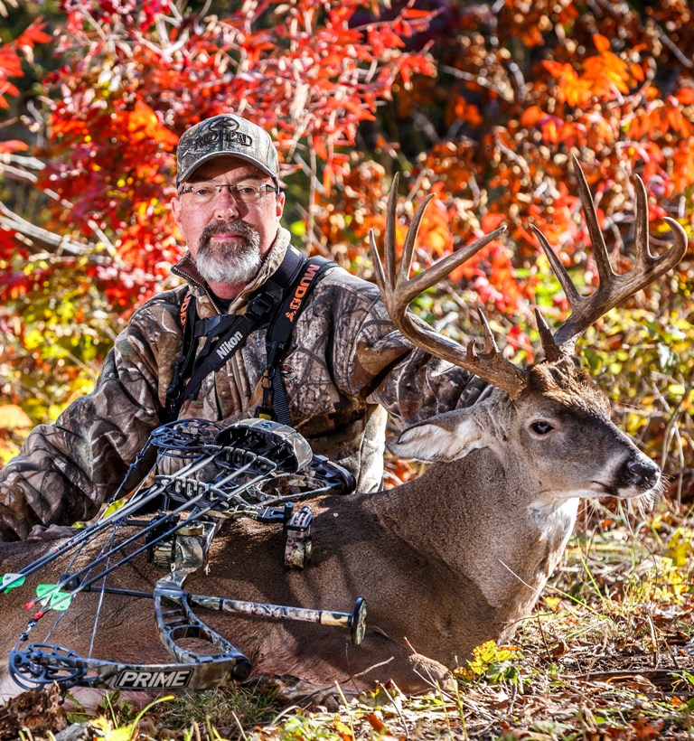 Grant with a great buck he took while hunting a travel corridor during late October!