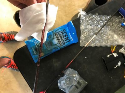 Cleaning a Bloodsport arrow with a D/Code field wipe