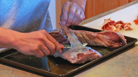 Cleaning a venison backstrap before packaging