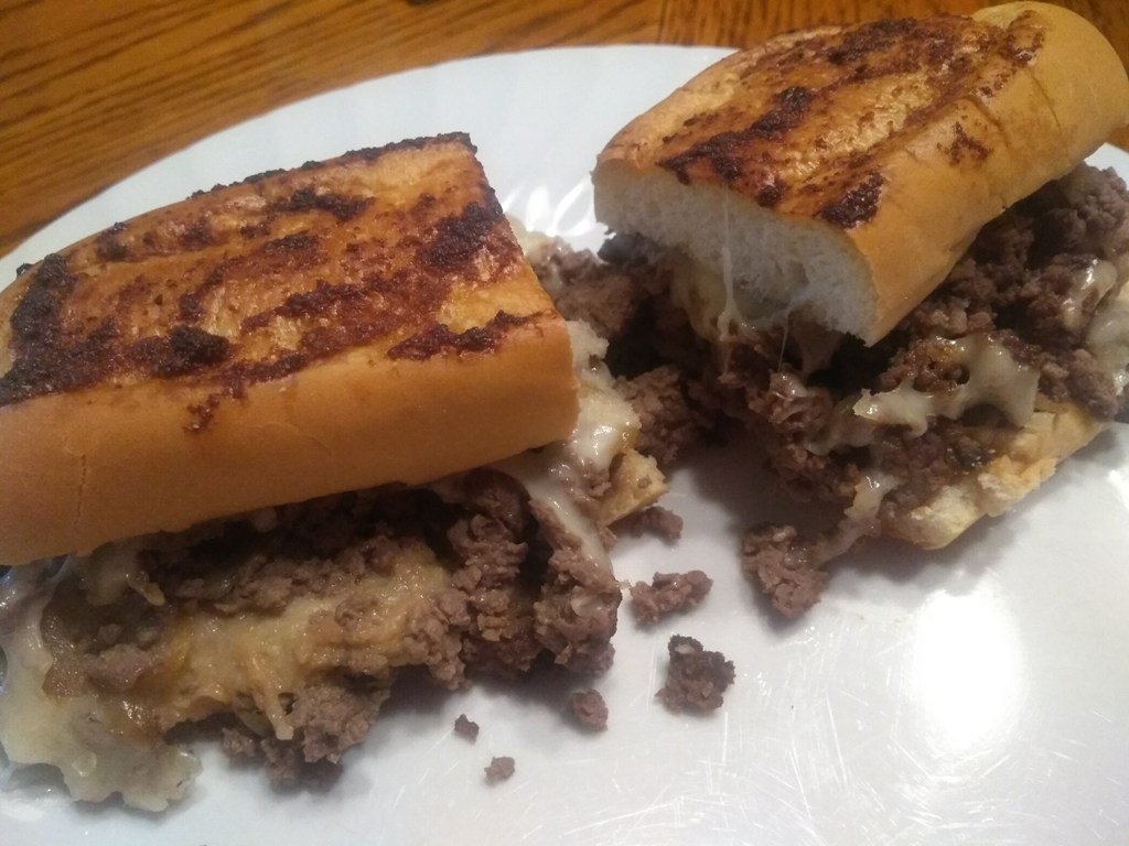 Baked Venison Sandwiches on a white plate