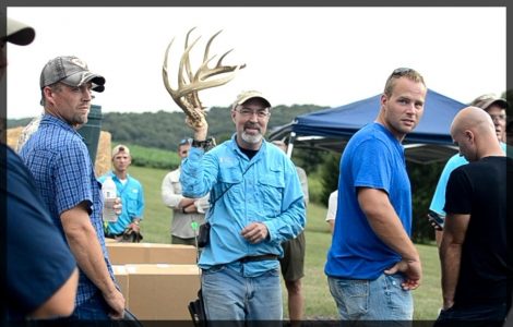 Grant holds up a matching set of shed antlers