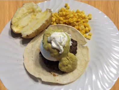 Venison sausage with a poached egg