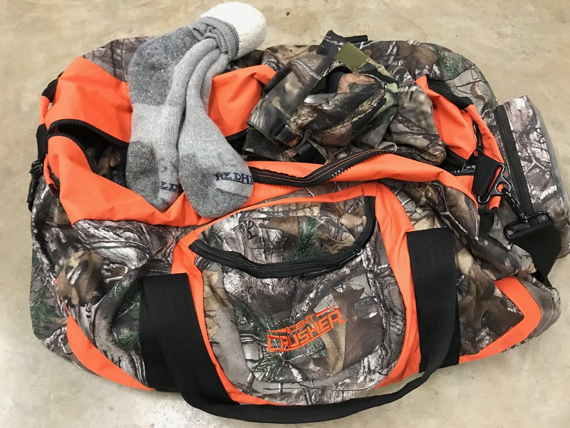 hunting clothes in a scentcrusher bag