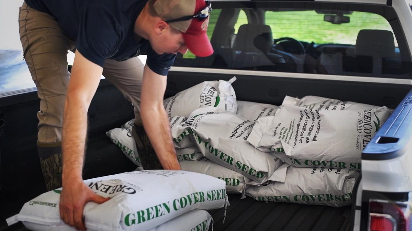 Spring Release Food Plot seeds from Green Cover Seed being loaded in truck by Clay